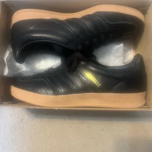 Adidas Black and Tan Sneakers with Skateboarding Style