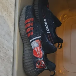 Black and Red Athletic Sneakers with Modern Design