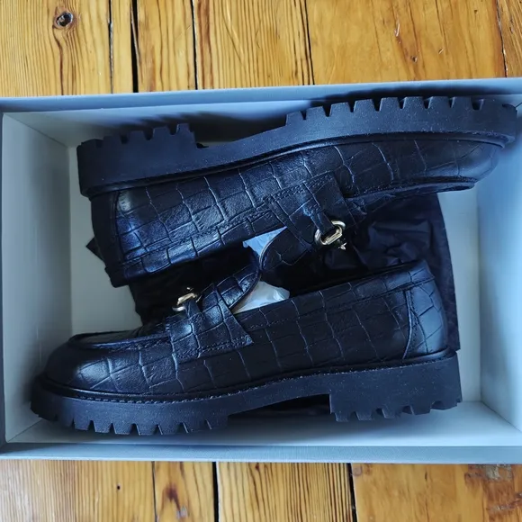 Black Leather Loafers with Gold Detailing