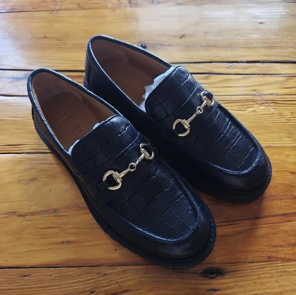 Black Leather Loafers with Gold Detailing