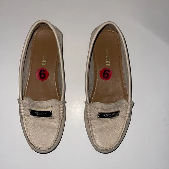 Coach Fredrica driving Moccasins