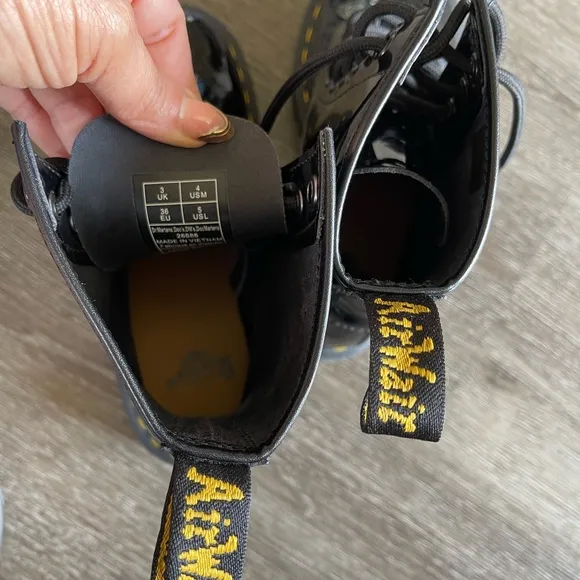 Dr. Martens Black and Yellow Combat Boots with Rugged Silhouette