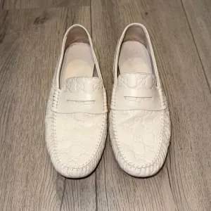 Gucci White Guccissima Leather Penny Loafers