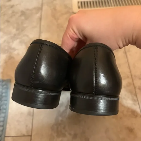 Salvatore Ferragamo black leather rain lux penny loafers