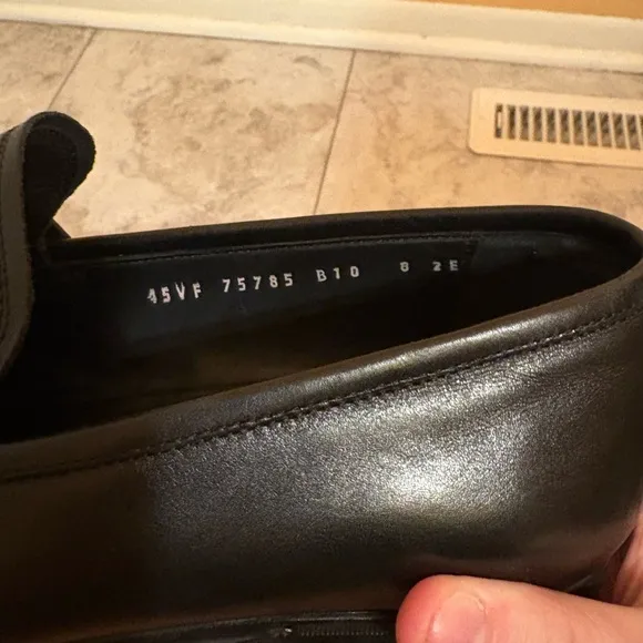 Salvatore Ferragamo black leather rain lux penny loafers
