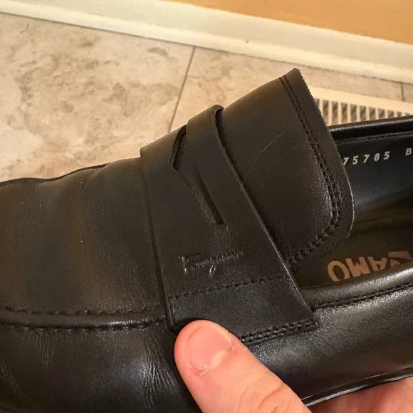 Salvatore Ferragamo black leather rain lux penny loafers