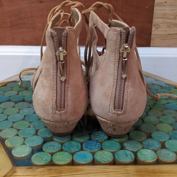 Size 8 and 1/2. Sam Edelman tan lace-up gladiator sandals