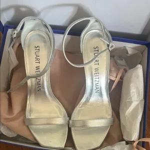 Stuart Weitzman Silver Heels.