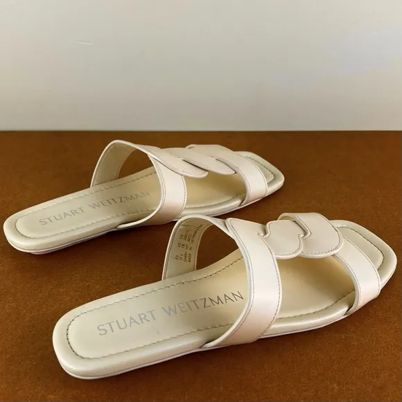 STUART WEITZMAN TWISTED LEATHER SANDALS