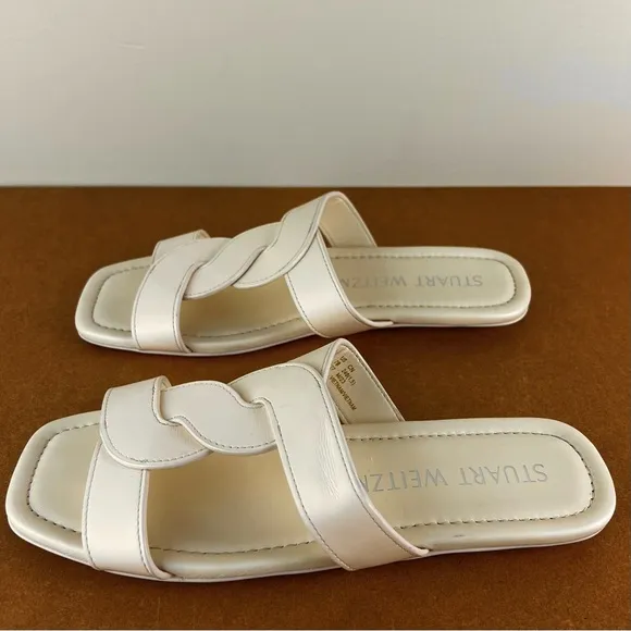 STUART WEITZMAN TWISTED LEATHER SANDALS