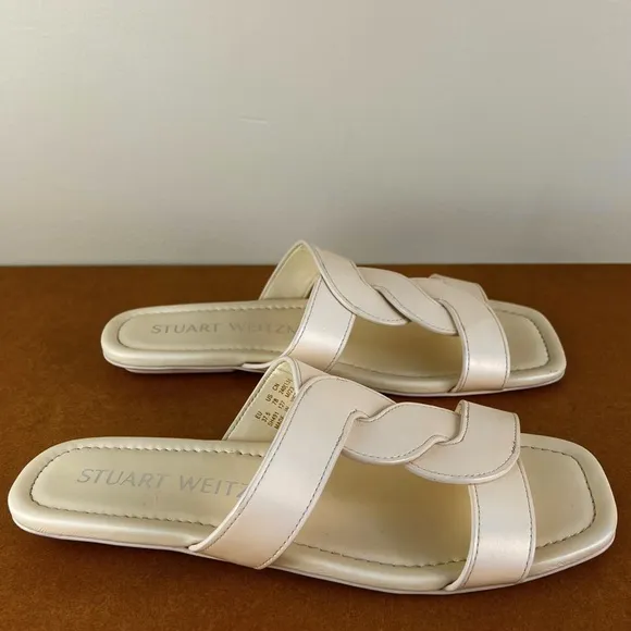 STUART WEITZMAN TWISTED LEATHER SANDALS
