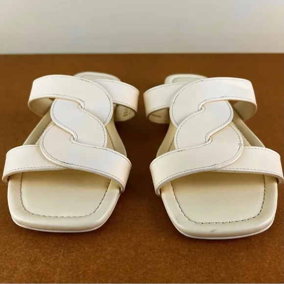 STUART WEITZMAN TWISTED LEATHER SANDALS