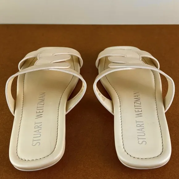STUART WEITZMAN TWISTED LEATHER SANDALS