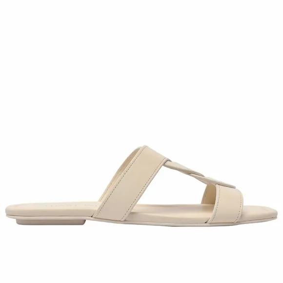 STUART WEITZMAN TWISTED LEATHER SANDALS