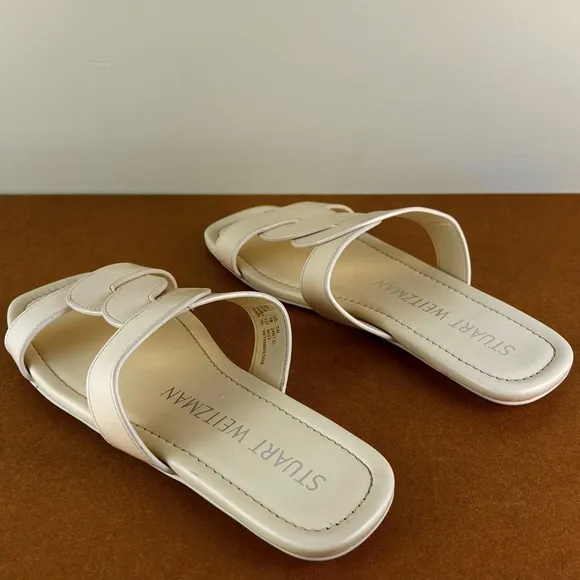 STUART WEITZMAN TWISTED LEATHER SANDALS