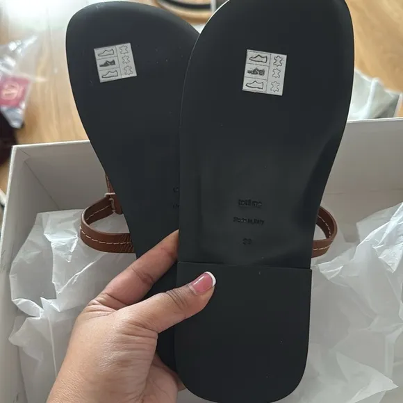 The T-strap leather sandals
