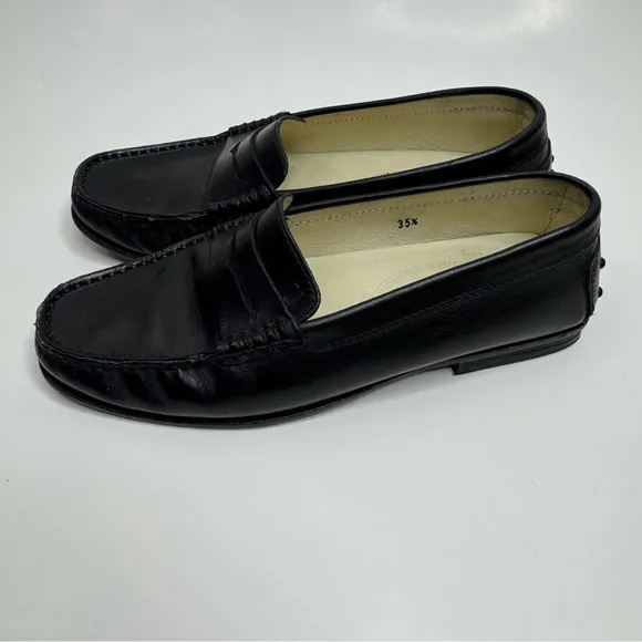 Tod’s Classic Black Leather Penny Loafers