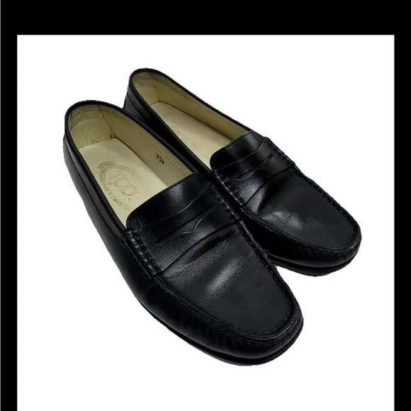 Tod’s Classic Black Leather Penny Loafers