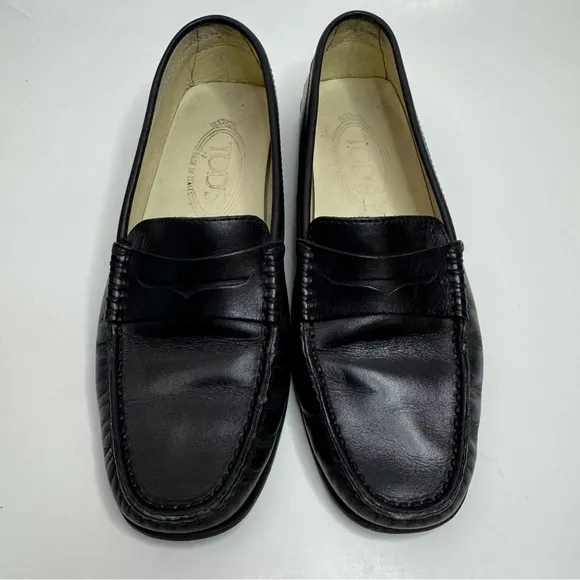 Tod’s Classic Black Leather Penny Loafers