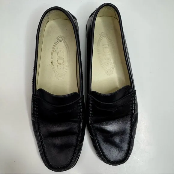 Tod’s Classic Black Leather Penny Loafers