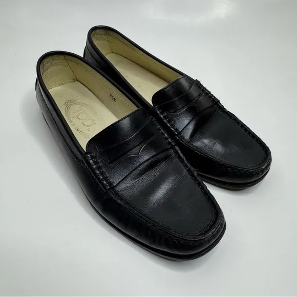Tod’s Classic Black Leather Penny Loafers