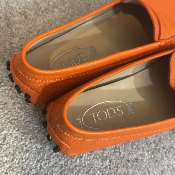 Tod’s Gommini orange pebble leather penny slip on loafers size 8