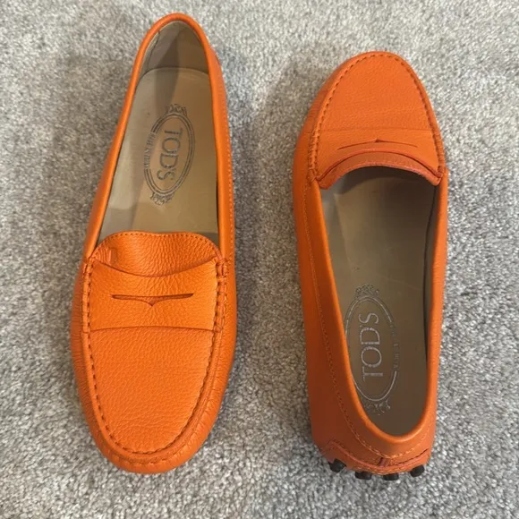 Tod’s Gommini orange pebble leather penny slip on loafers size 8