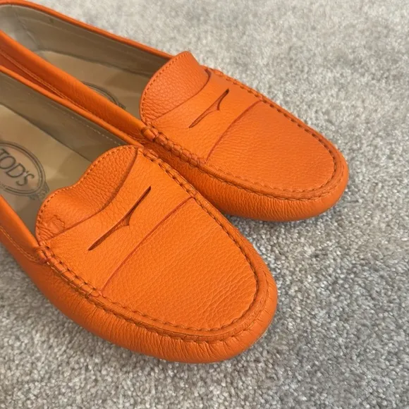 Tod’s Gommini orange pebble leather penny slip on loafers size 8