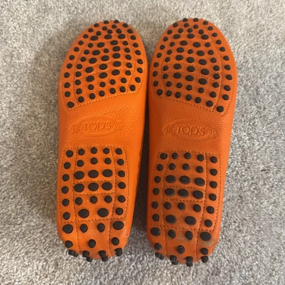 Tod’s Gommini orange pebble leather penny slip on loafers size 8