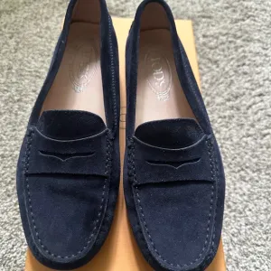 Tod’s Suede Driver Penny Loafers