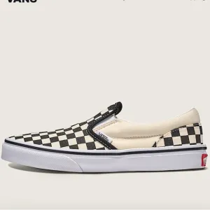Vans Black and White Checkerboard Slip-On Sneakers
