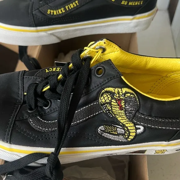 Vans Black and Yellow Sneakers with Iconic Waffle Sole