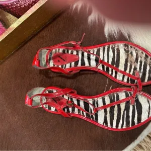 Vibrant Red Zebra Print Sandals with Open Straps
