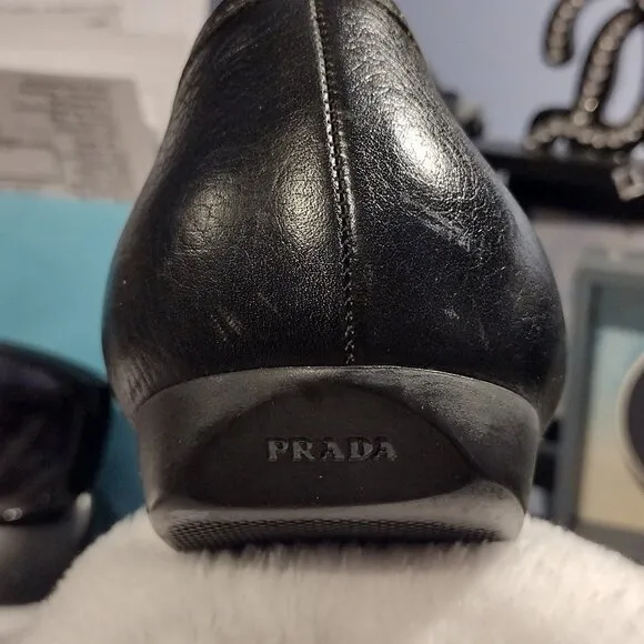 Vintage Prada Women Black loafers with white stitching  (US 9)